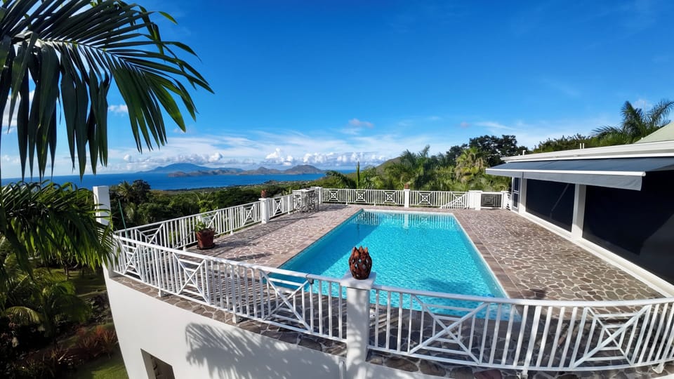 Elevated Pool and Deck Overlooking the Caribbean Sea 