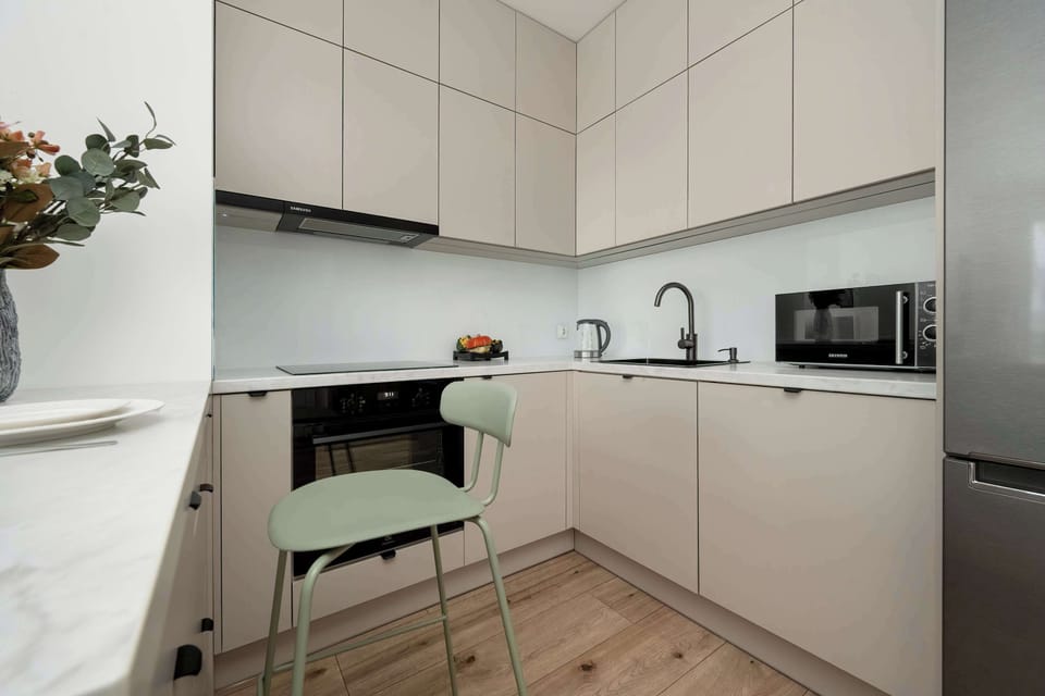 The kitchenette's practical layout maximizes space and functionality.