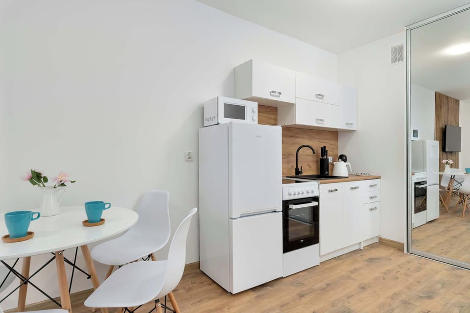 The kitchenette's practical layout maximizes space and functionality.