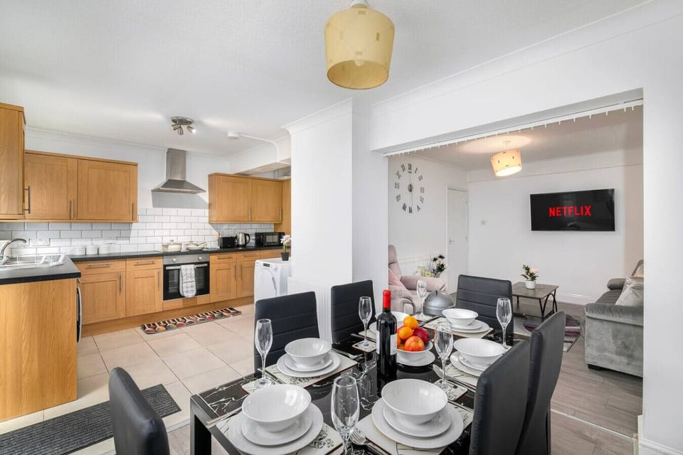 Modern kitchen with appliances and view to dining table