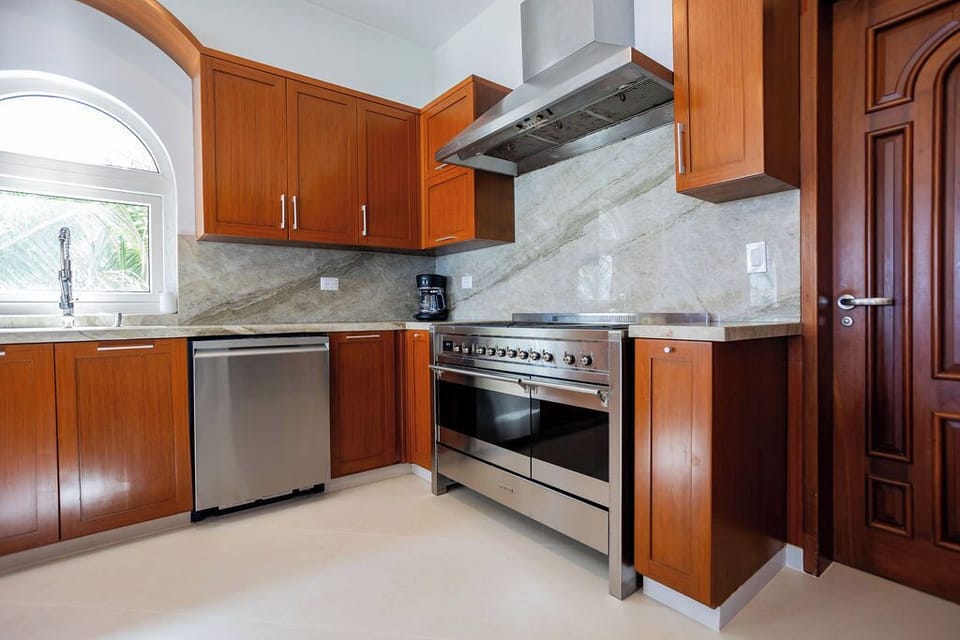 Kitchen - dishwasher and double oven range with cooktop