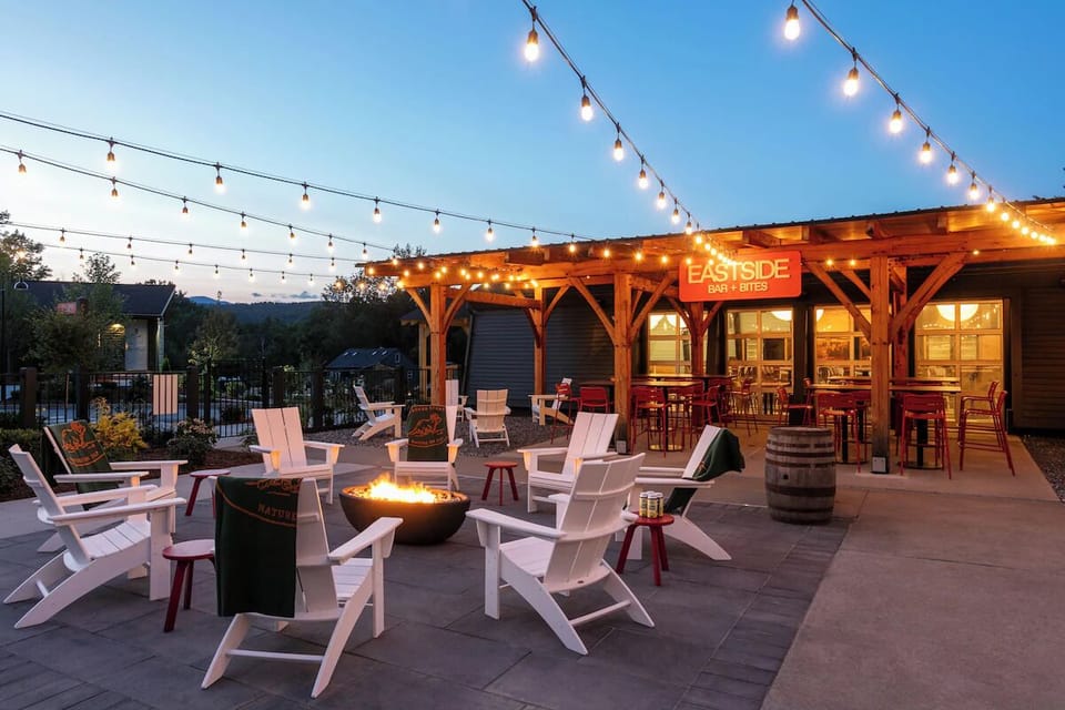 Sip and socialize under twinkling lights by the firepit.