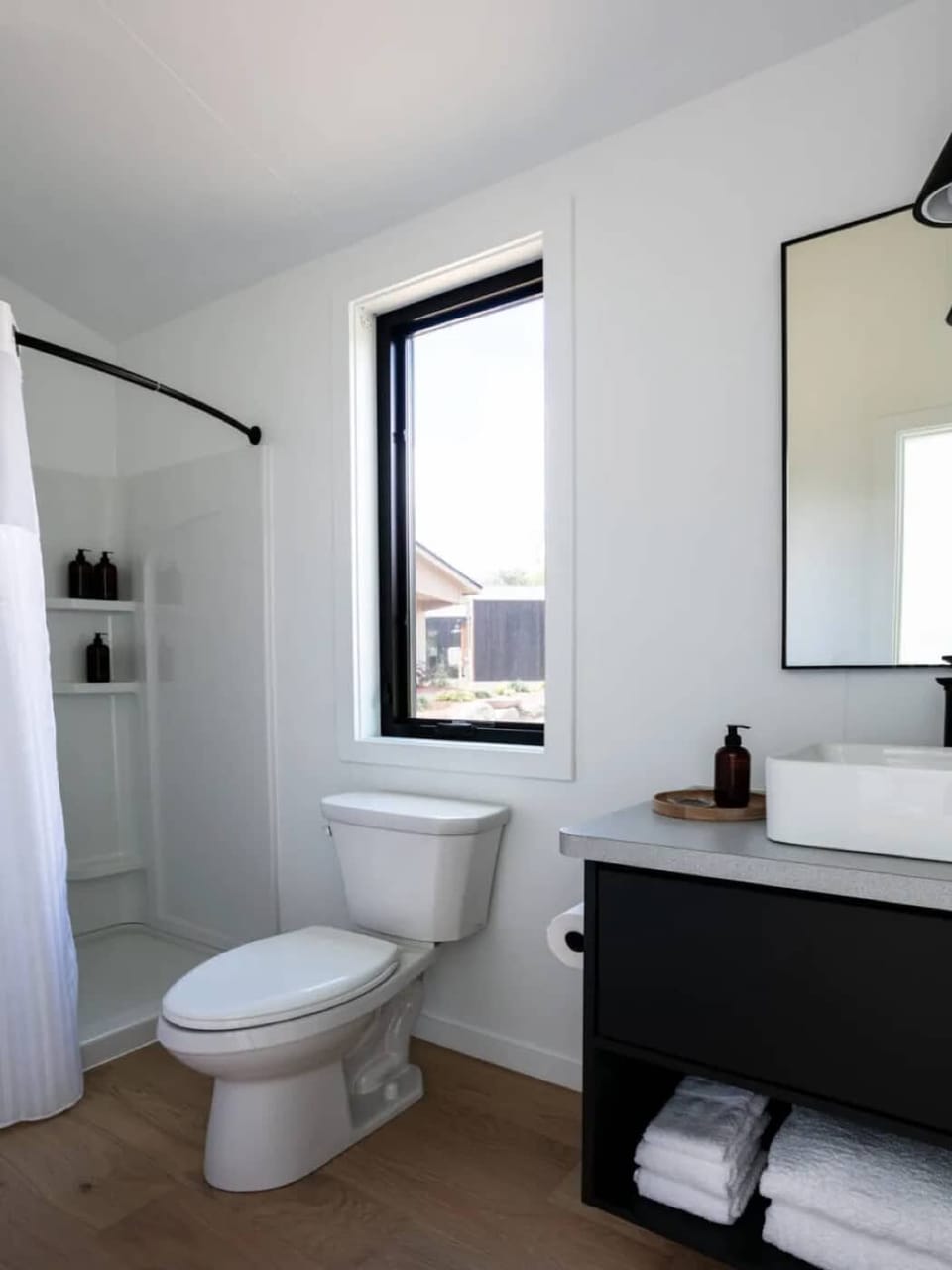 Refresh in the bright, spa-clean bath with modern finishes.