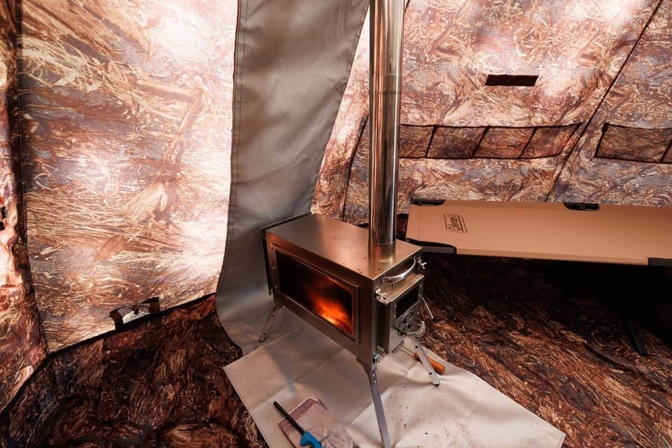 Wood stove, 2 cots, 2 camp chairs, LED Light