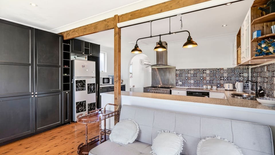 Open dining area connected to the kitchen, ideal for shared meals