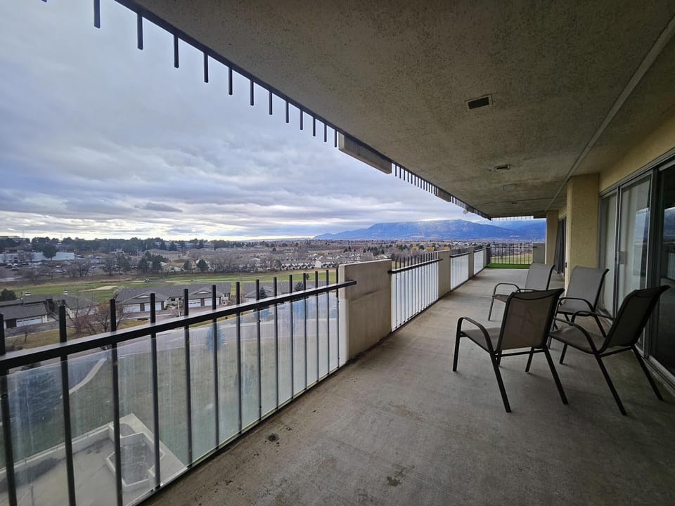 Balcony from the walk out at the Master Bedroom- looking toward Cheyenne Mountain & the Valley-Hi Golf Course next door