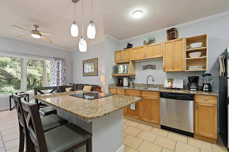 Whip up delights and toast to jungle views from your island.

