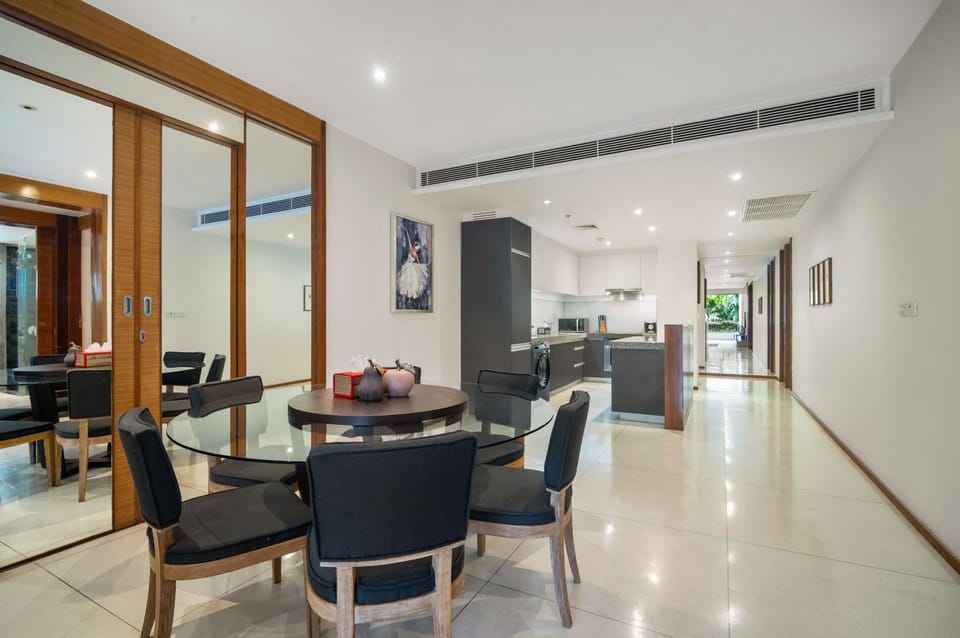 Open-plan interior showcasing living and dining areas, modern finishes, and spacious design perfect for families or groups.