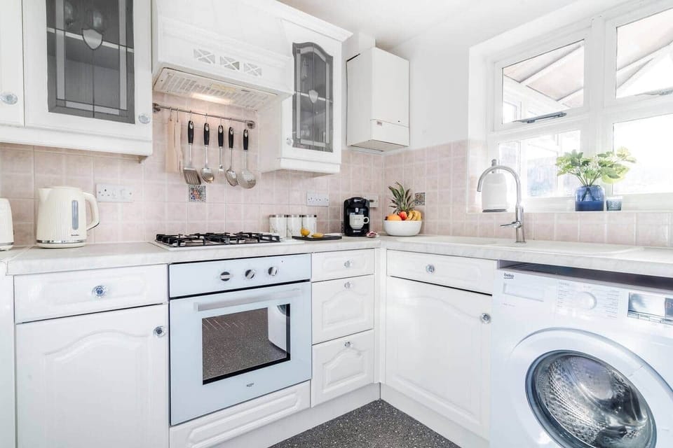 Cozy kitchen with all the amenities you need to cook up some wholesome meals! BOOK YOUR STAY NOW