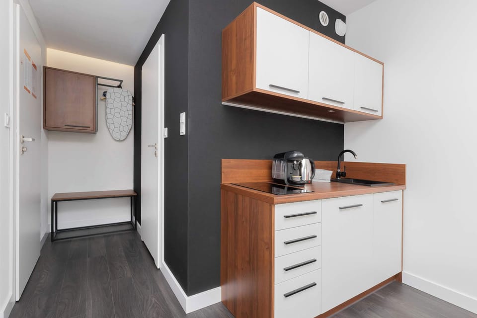 Kitchenette with a kettle.