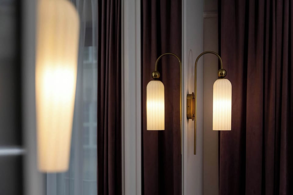 Minimalist hanging lights creating a warm, ambient glow.