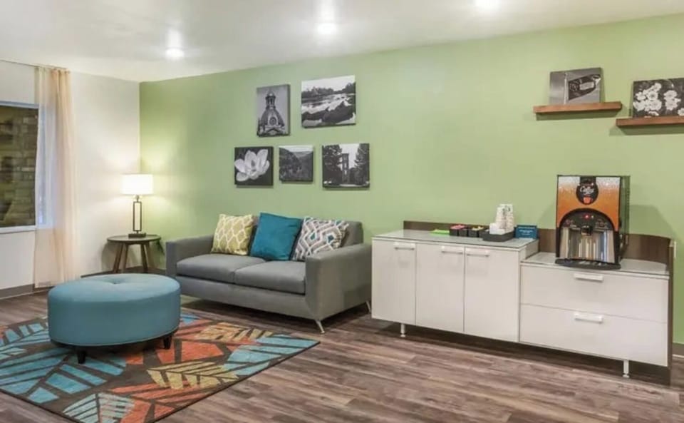 Unwind on the cozy sofa with warm evening lighting.