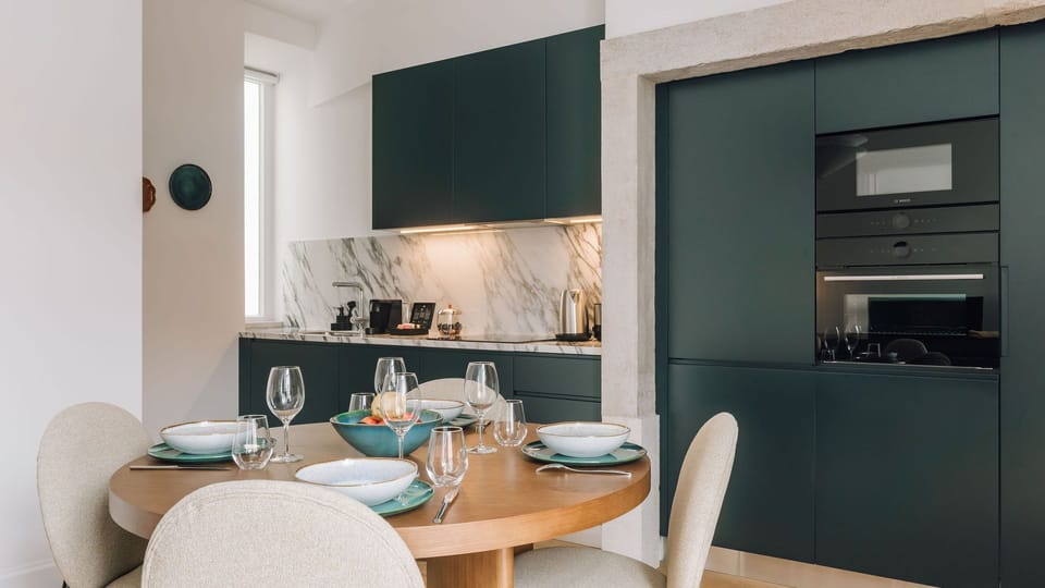 A beautifully set table for unforgettable moments in a tasteful dining area.
 #AndoLiving #Portugal #Santos #DiningInStyle #CozyLuxury