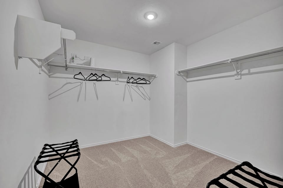 Walk-in closet with ample storage space