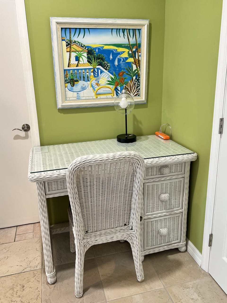 The family room includes a convenient computer desk for getting  work done.