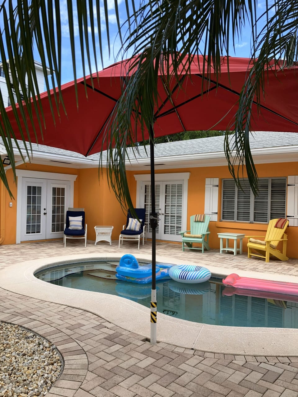 "Shade meets shimmer; the PERFECT POOL MOMENT.  shaded pool seating 