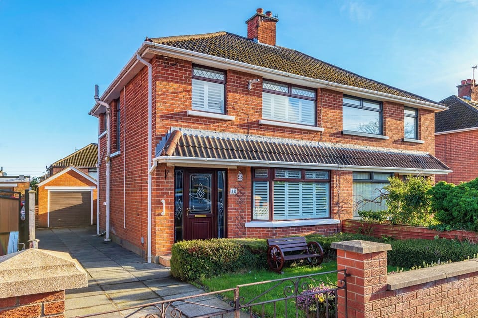 Charming brick facade with a welcoming entrance, perfect for your Belfast stay.