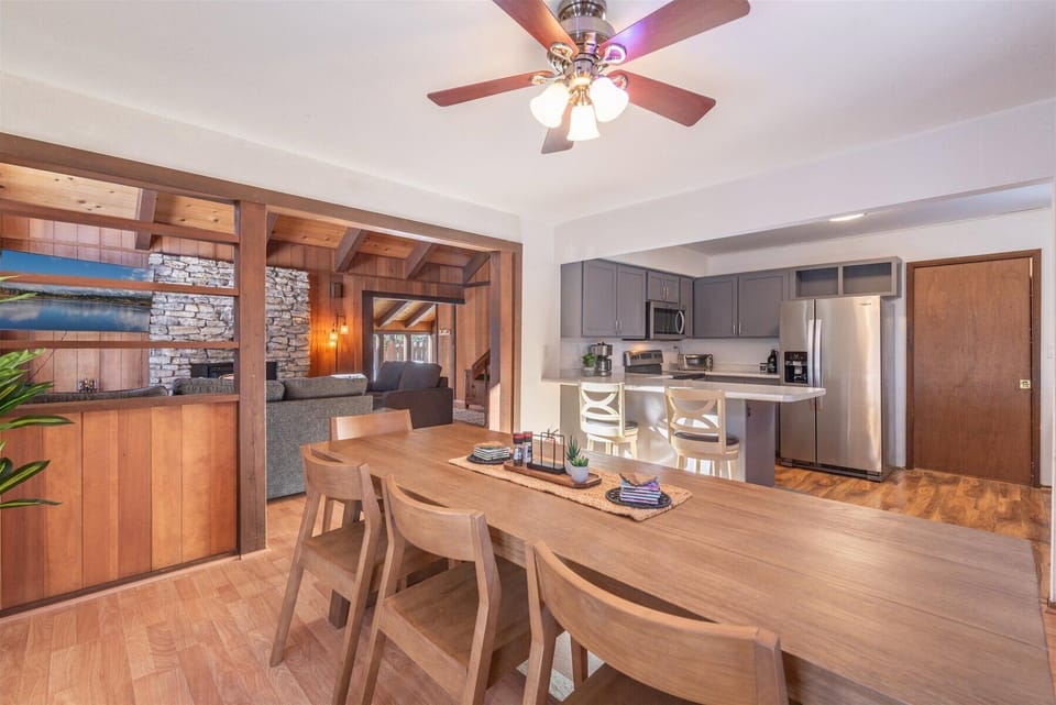The open concept dining area and kitchen allows everyone to stay connected during meals.