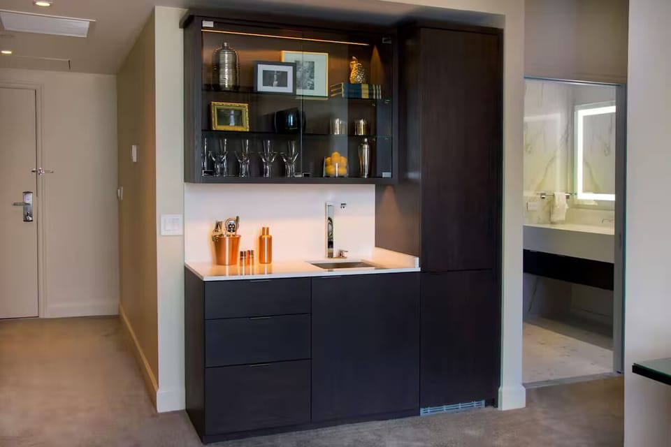 Pour a nightcap at the chic wet bar after exploring.