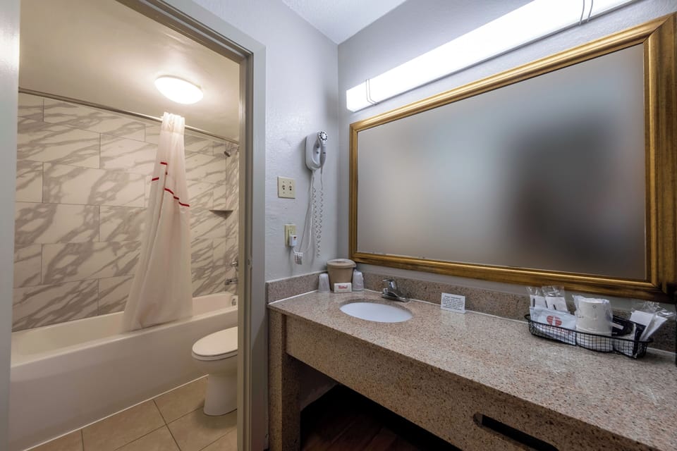 Rinse off and recharge in a clean tub-and-shower combo.