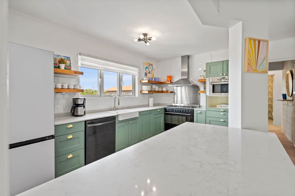 Spacious kitchen island perfect for cooking, casual dining, and gathering together. A central spot designed for easy entertaining and shared moments.