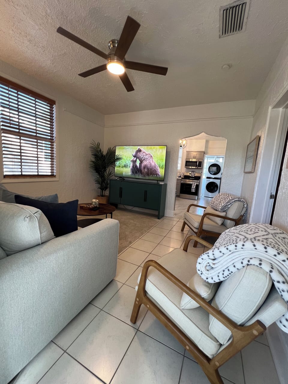 Living Room with 67" TCL Google TV, pull out couch with memory foam mattress