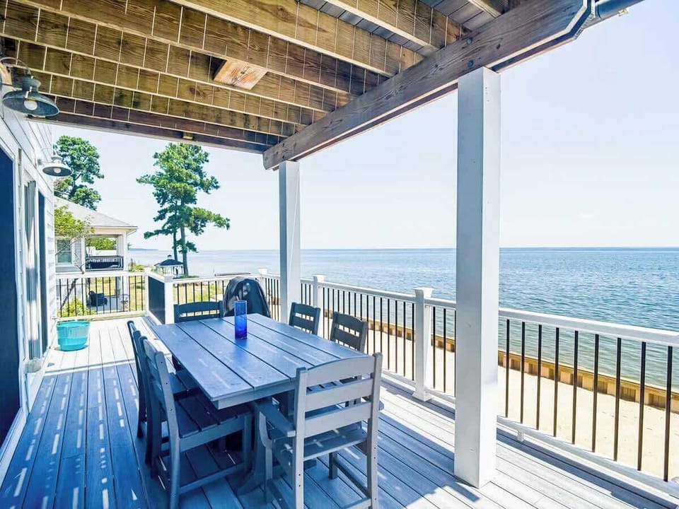Covered deck w/ seating, perfect for slow mornings or sunset chats.