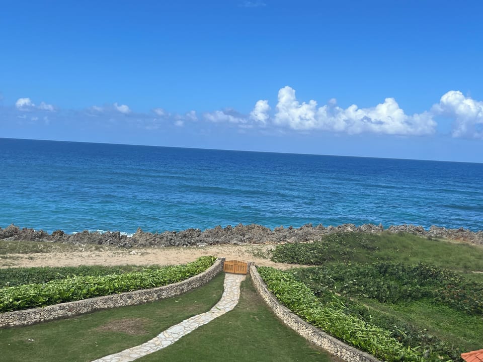 path in front of condo building to the beach/ocean