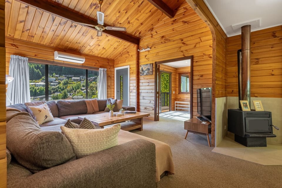 Open plan living area makes for an inviting place to relax (fire not for guest use)