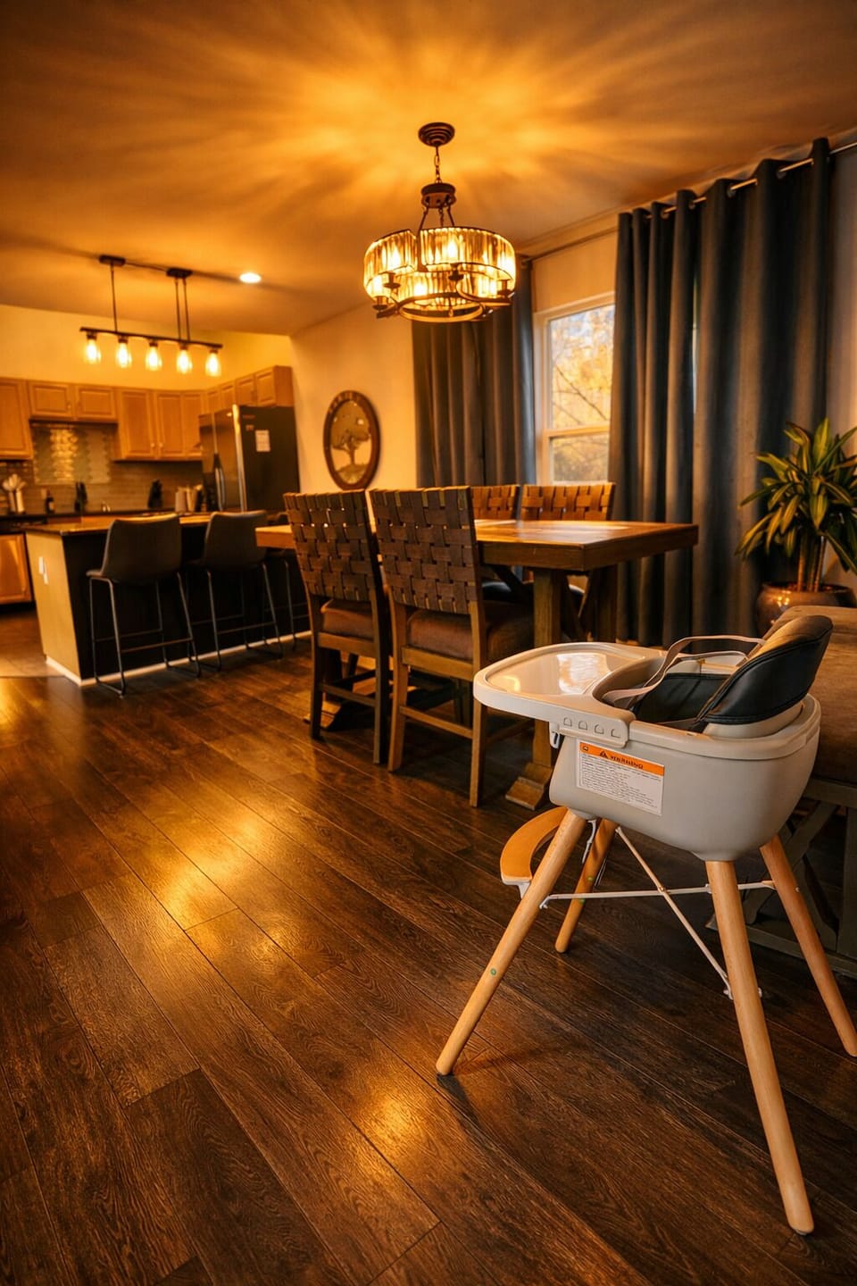 Family-friendly dining area with high chair and cozy cabin atmosphere