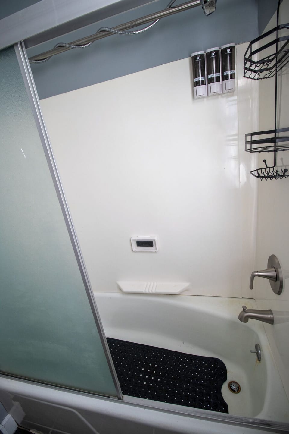 Clean and convenient shower/tub combo. 