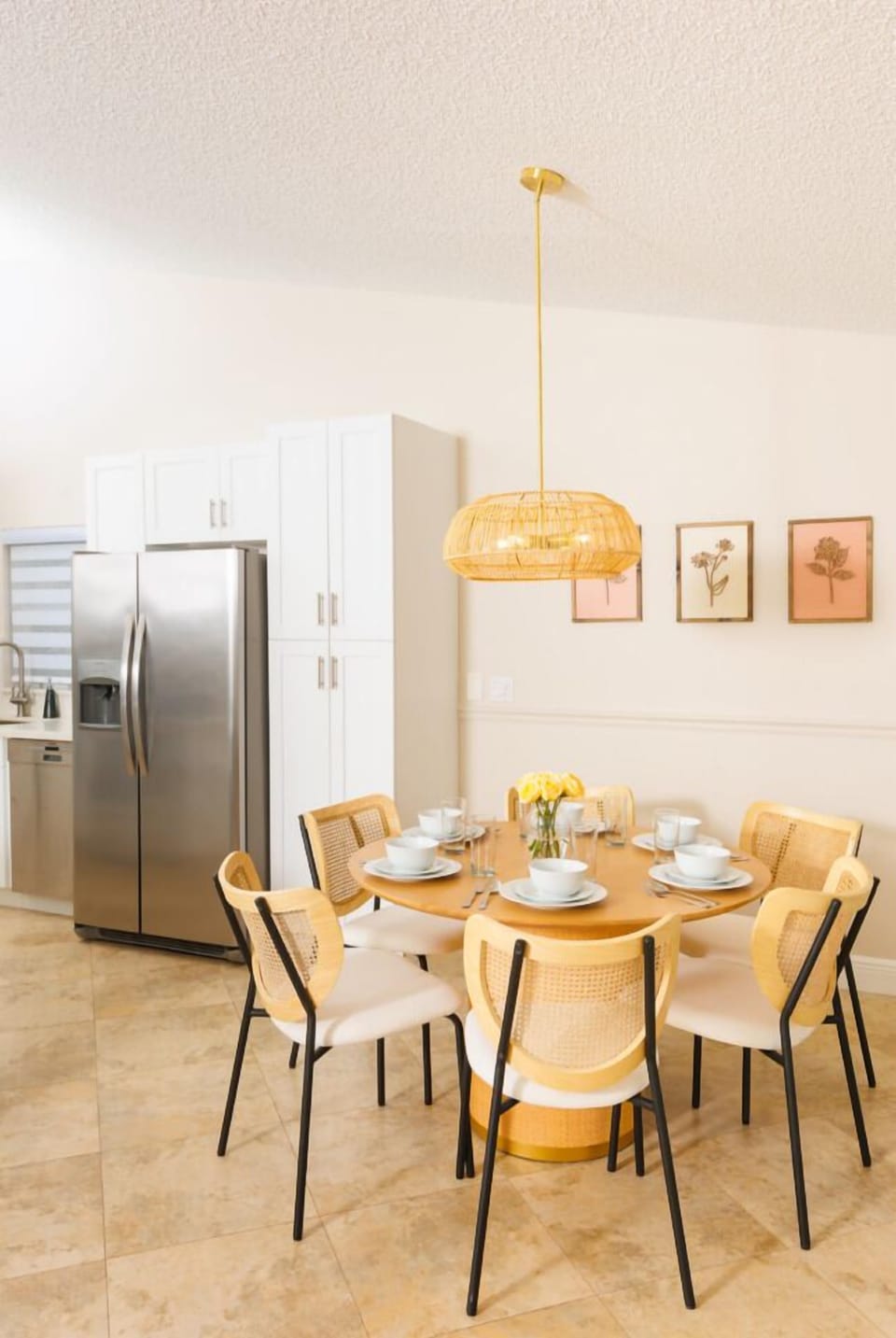 Our dining area features a large table perfect for family gatherings and holiday feasts. Additionally, there's a smaller table in a well-lit corner, ideal for casual meals or morning coffee.