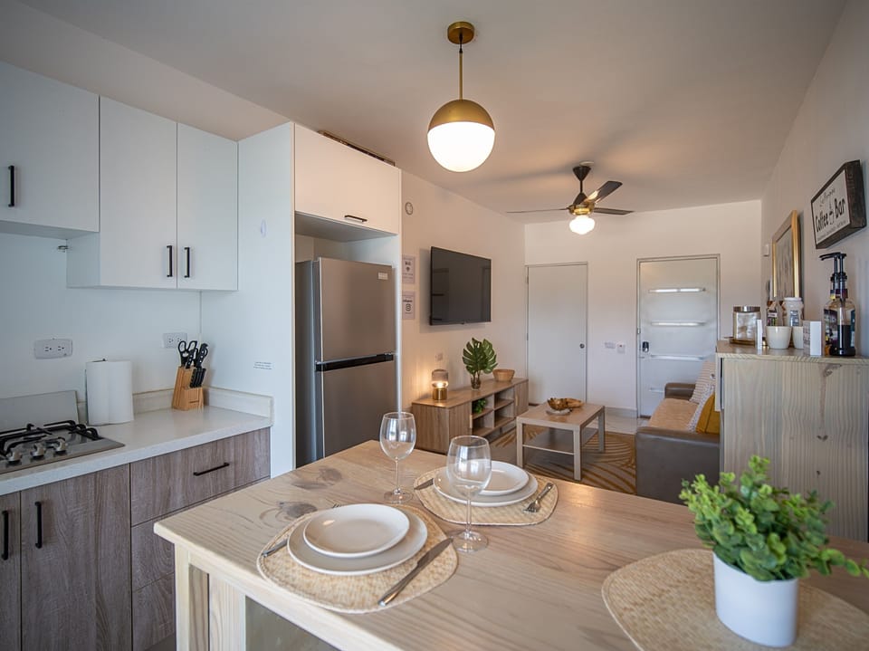 Dining and Living Area: Bright space with modern decor, perfect for entertaining and relaxation!