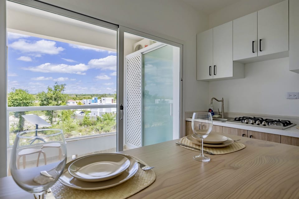 Private Balcony for Morning Coffee or Golden-Hour Views Sip local Dominican coffee, watch palm trees sway, and let time slow down — your quiet escape above the village.