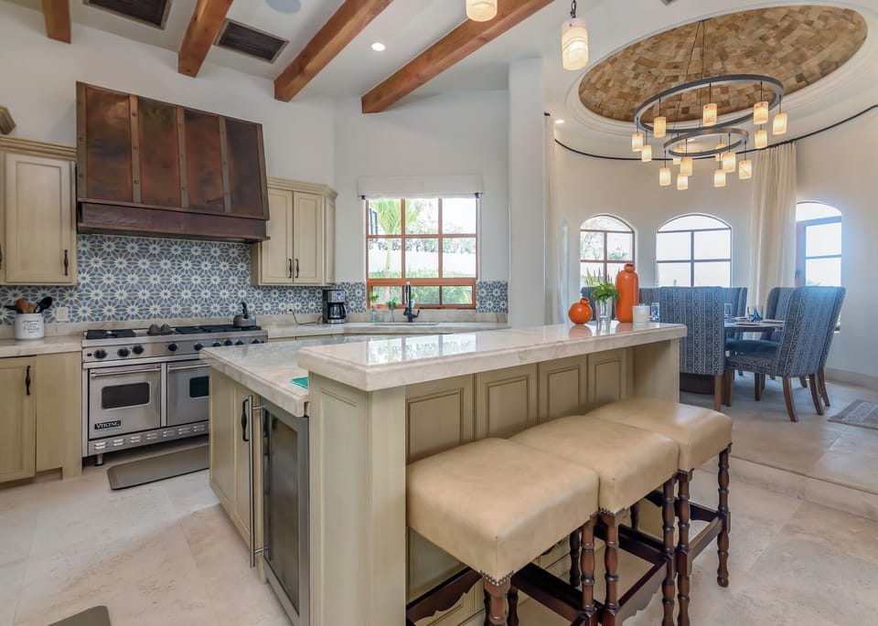 Fully equipped gourmet kitchen with a spacious island, designed for a full chef experience.