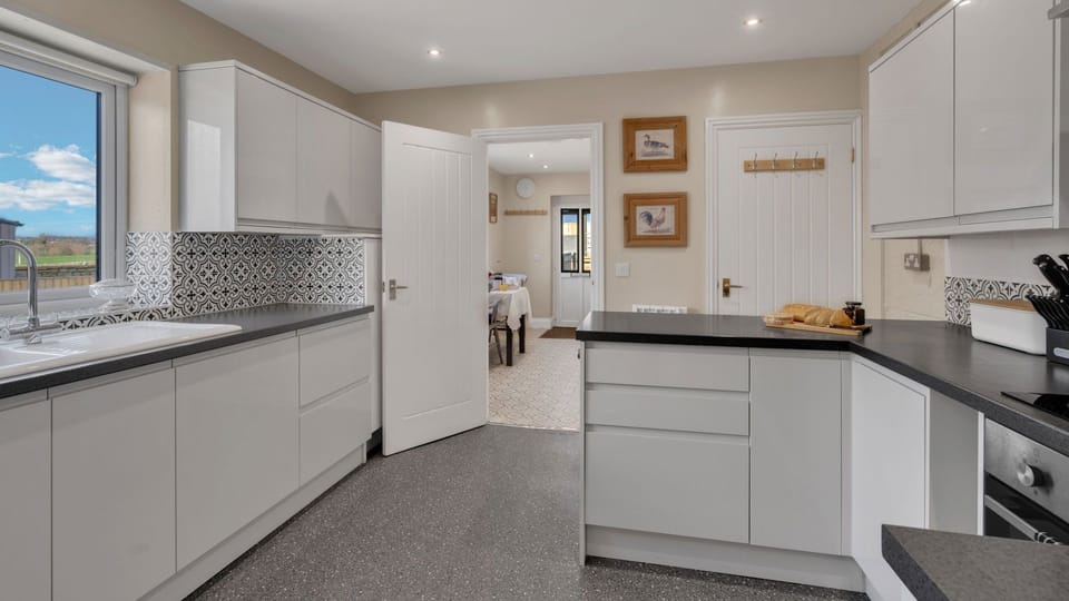Worktop space and storage is in abundance and you have an oven/hob, kettle and toaster.