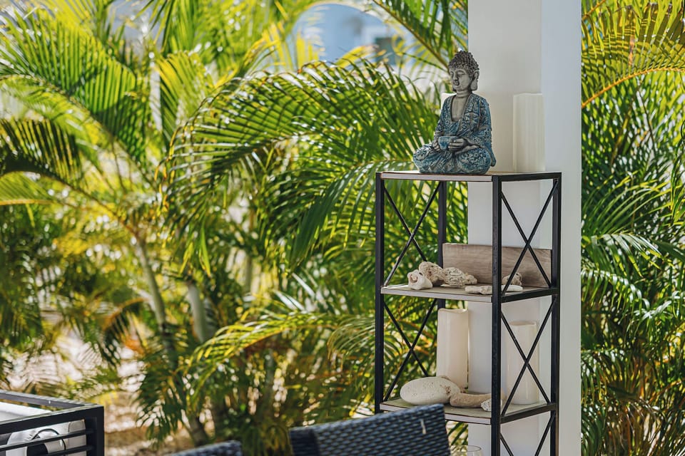 Tranquil garden detail adding a calm, spa-like touch to the outdoor space.