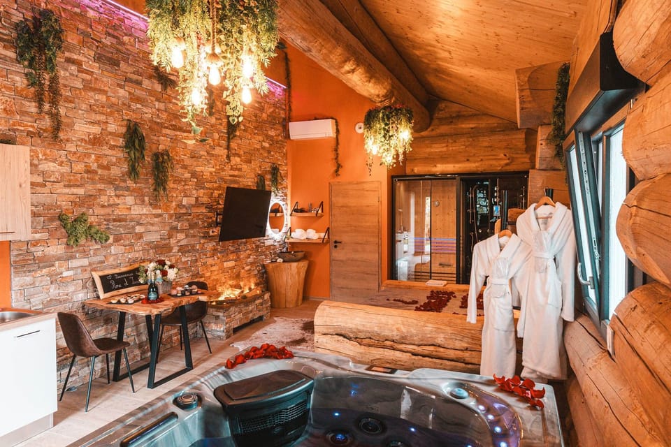 Suite chalet avec jacuzzi, cheminée et cuisine équipée