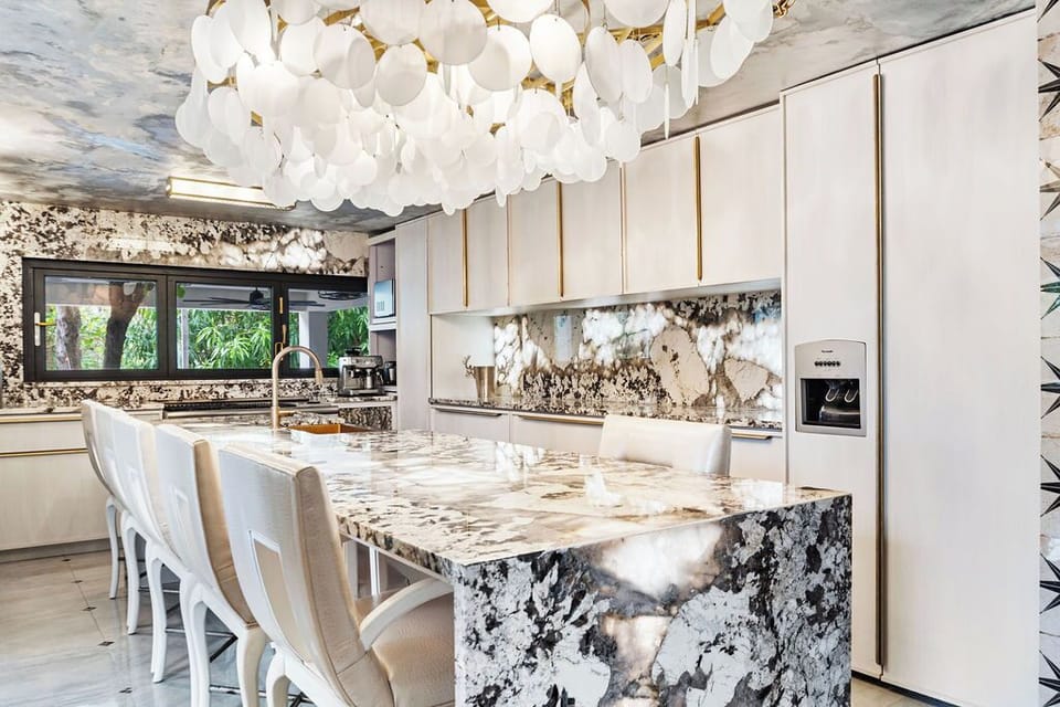 Get cooking in our sleek kitchen with a large, illuminated island bar, perfect for entertaining.