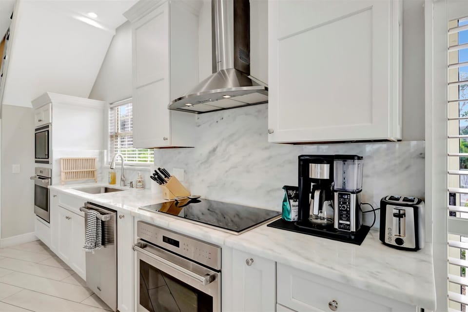 Cook with Ease in This Kitchen with Premium Appliances and Ample Counter Space