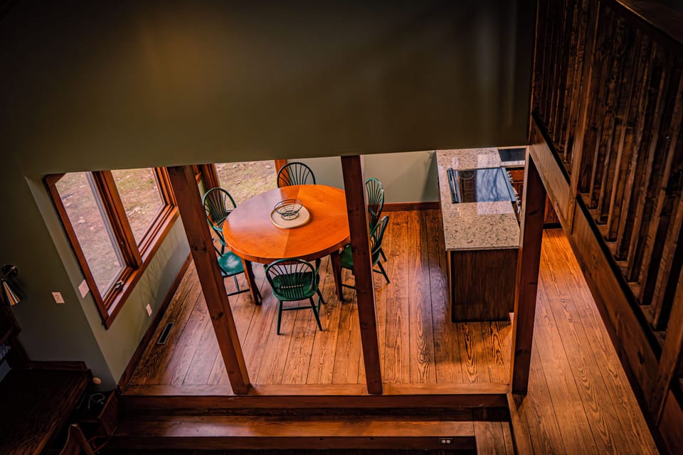 Gather, cook, connect—rustic dining with mountain light and cozy charm