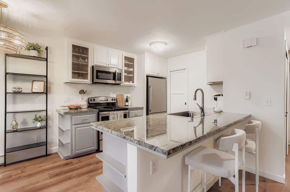 Complete kitchen with cookware, utensils, and appliances for daily use