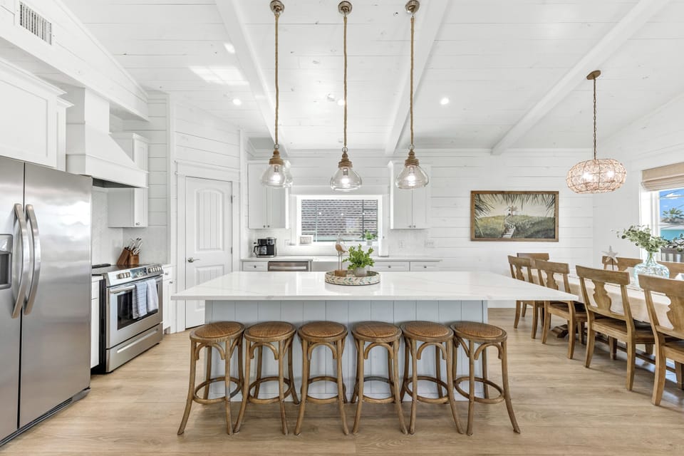Island seating for 6 makes a great spot for breakfast.