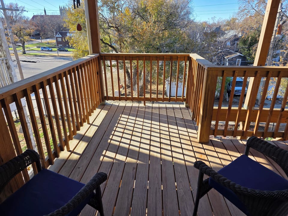 View of the deck from the back door of the apartment.