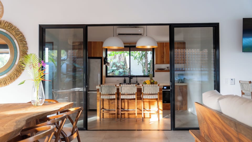 Open-concept living that seamlessly connects you to the tropical breeze