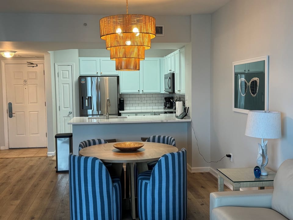 The kitchen table sits four people comfortably with an additional two seats at the kitchen countertop.
