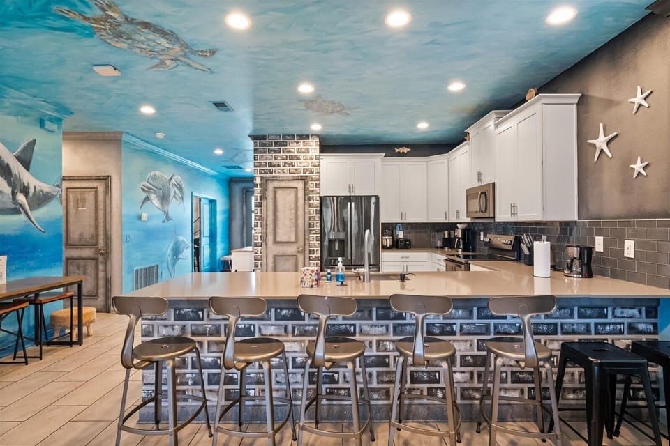 Kitchen with kitchen counter seating for 6