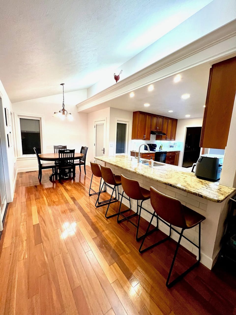 Open bar seating and breakfast nook