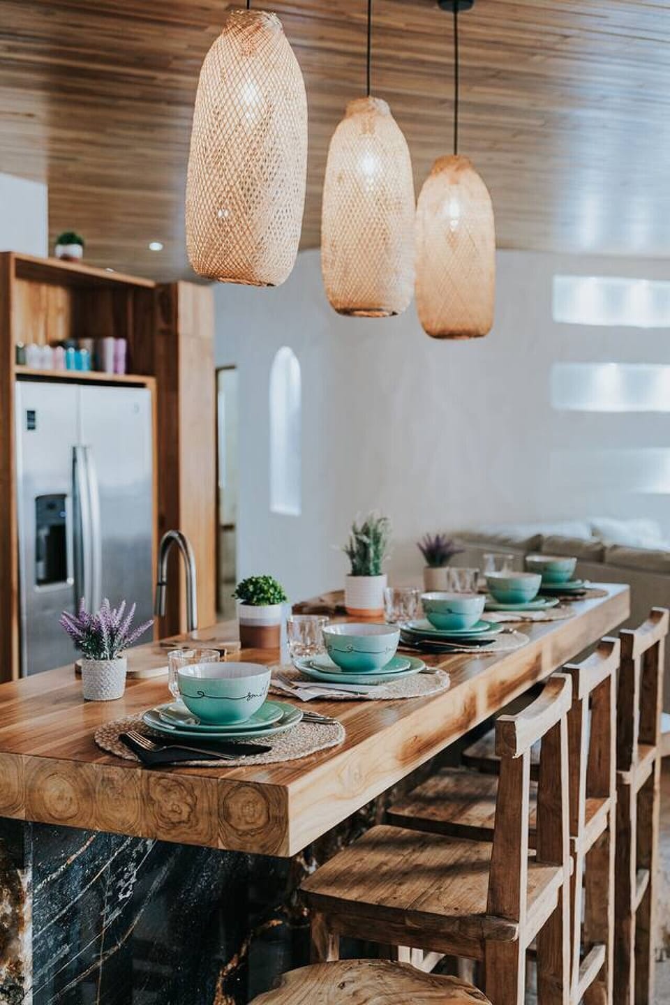 This artistic close-up shows off the warmth and detail of the dining bar, from the rich woodgrain to the soft glow of the pendant lights. It captures the cozy, polished feel that makes this spot such a natural place to gather.