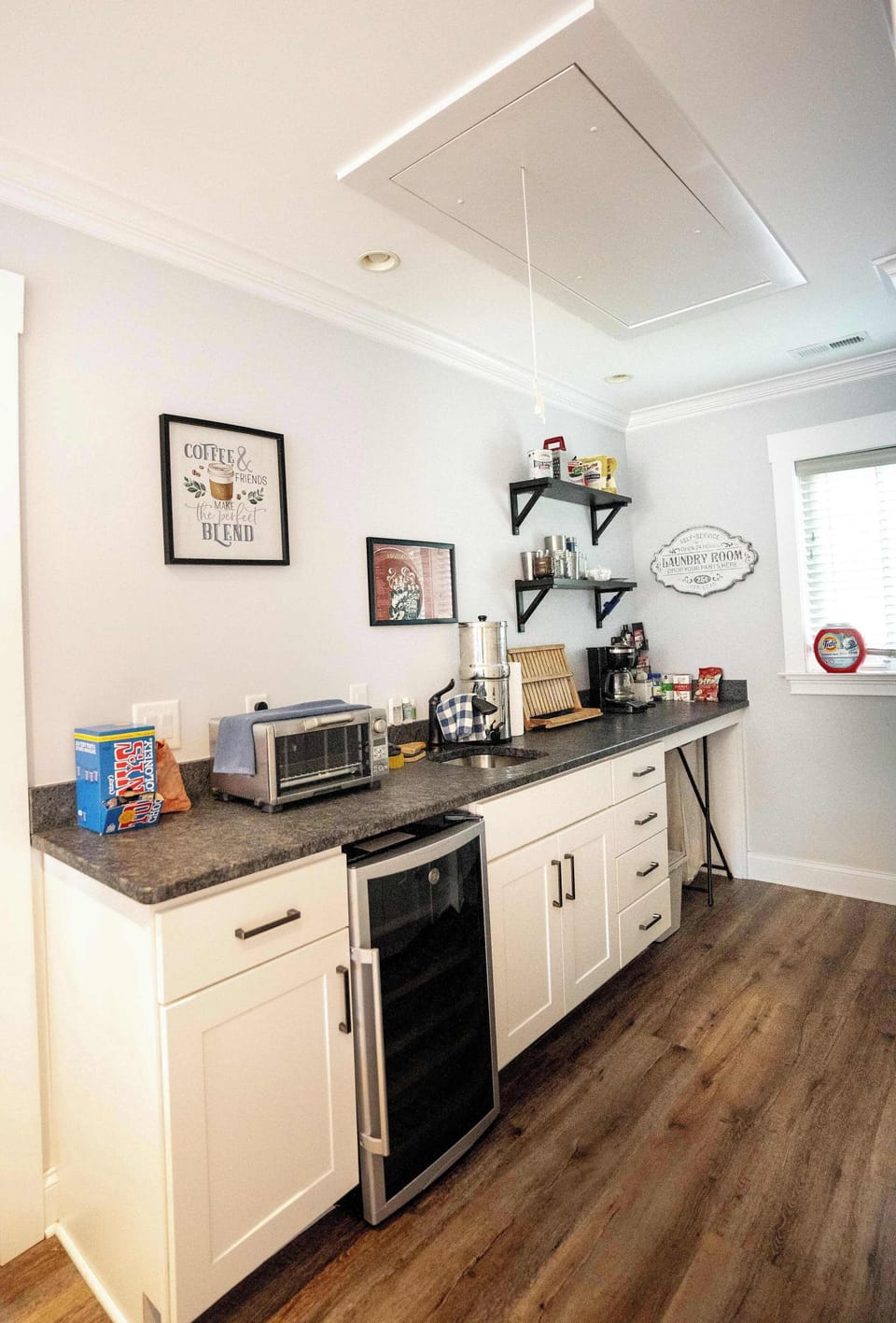 Your little kitchenette! A toaster oven, coffee maker, water filter, and our favorite part - the snacks :o)
